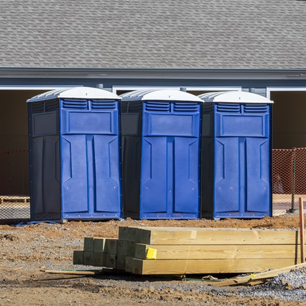 what is the cost difference between standard and deluxe porta potty rentals in Coleraine MN